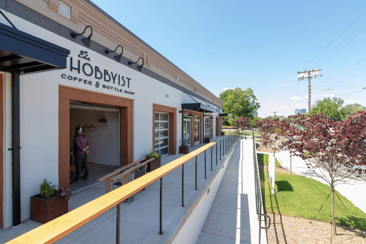 The Hobbyist in Villa Heights has outdoor seating with a view of the skyline.