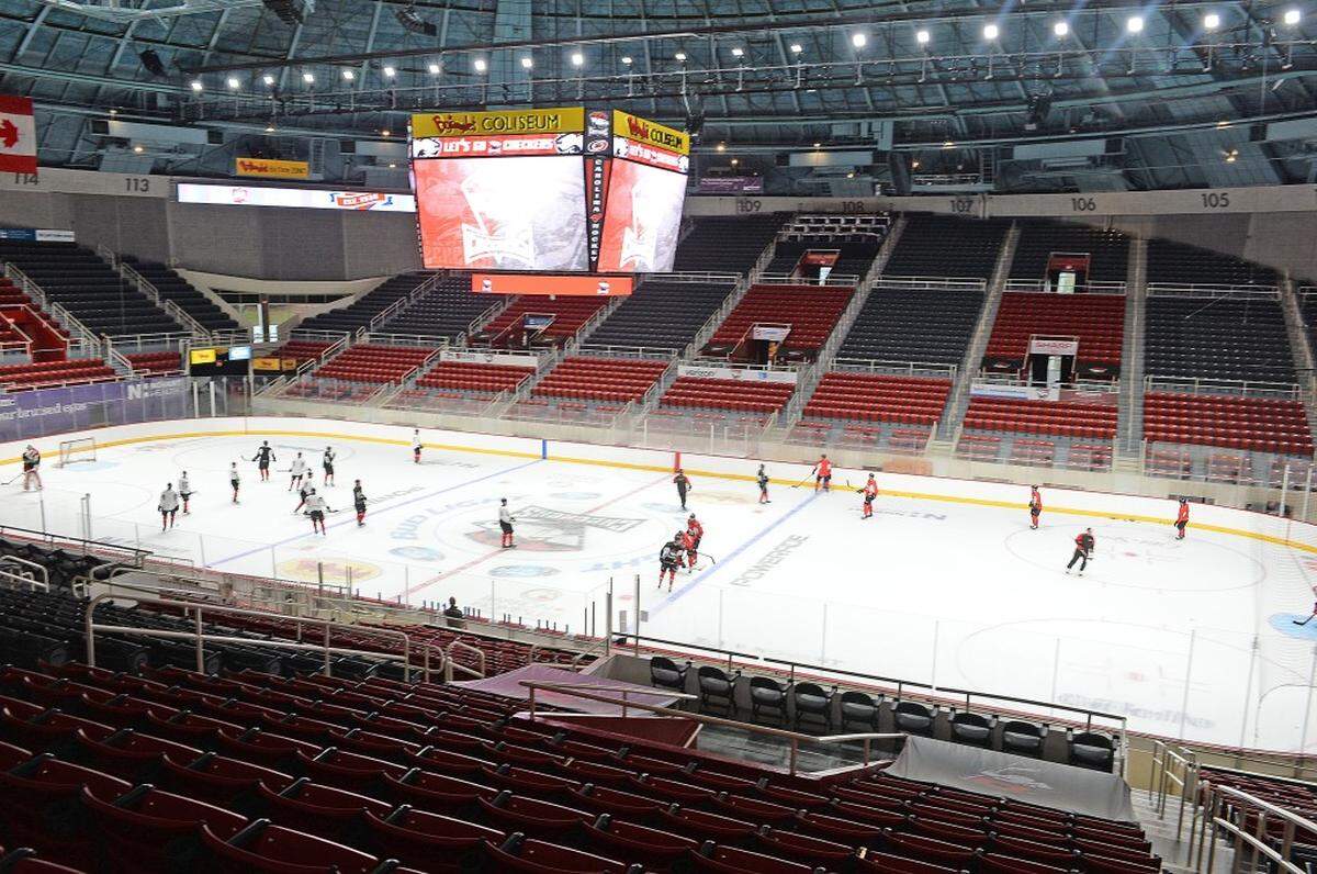 The Charlotte Checkers practice on the newly installed ice rink they will call home.Elected officials and  city representatives  attend  the grand opening celebrate of the completion of the Bojangles' Coliseum renovations. A ribbon cutting  marked the recently revamped 60-year old venue. Phase 1 of the $16 million project includes improvements to seating, technology, locker rooms and more. The completed  renovations came in time for the Charlotte Checkers season home opener on Saturday, Nov. 7 against the Manitoba Moose.
