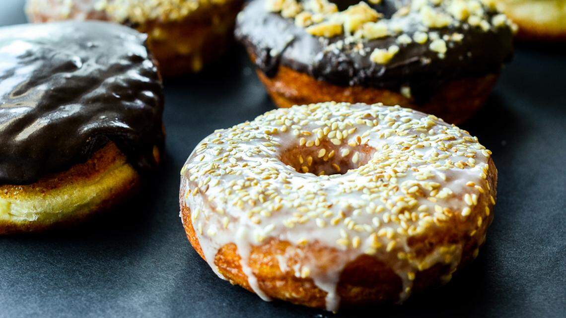 An assortment of doughnuts including the vegan Toasted Sesame Honey Doughnut at Pepperbox Doughnuts.