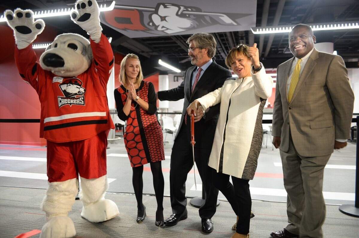 Charlotte Checker mascot, Chubby, Tara Black, Chief Operating officer for the Checkers, Tom Murray, CEO of CRVA, Vi Lyles, City Council At Large and Trevor Fuller, Commission Chairman  celebrate the official  grand opening of the newly renovated Bojangles Coliseum.Elected officials and  city representatives  attend  the grand opening celebrate of the completion of the Bojangles' Coliseum renovations. A ribbon cutting  marked the recently revamped 60-year old venue. Phase 1 of the $16 million project includes improvements to seating, technology, locker rooms and more. The completed  renovations came in time for the Charlotte Checkers season home opener on Saturday, Nov. 7 against the Manitoba Moose.