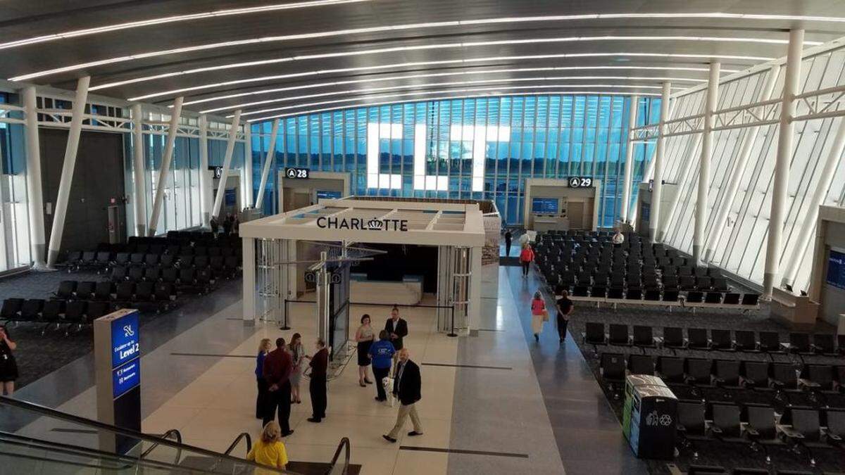 The new Concourse A North, with nine gates, opens next week at Charlotte Douglas International Airport. The new gates offer more amenities, such as outlets in every seat and more space for passengers, as Charlotte balances its low-cost, no-frills past with a flashier future.Photo by Ely Portillo
