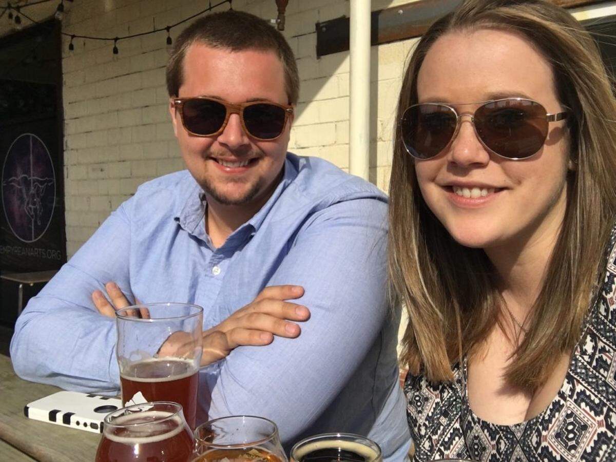 Courtesy of Jacob Fehl <br/>Jacob Fehl and Ashley Appell at Catawba Brewing in Asheville. The couple had their first date at NoDa Brewing Co. and have been making a point to visit breweries ever since.
