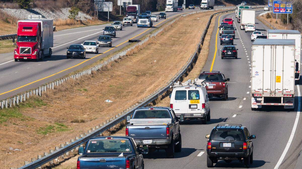 Mark Hames/Charlotte Observer<br/>Traffic on I-77 North of Charlotte looking north from the Highway 21 bridge where it crosses the interstate.