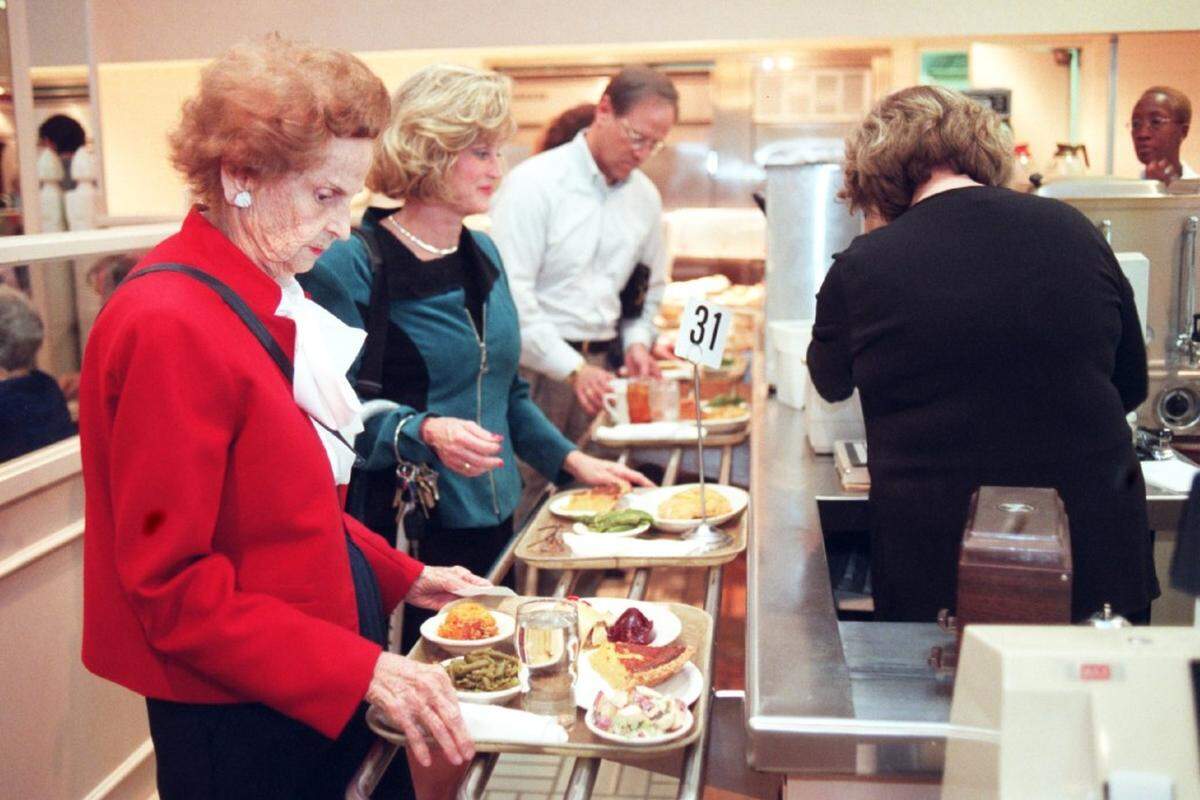 4/16/00 Jinks Covington (front), Janice Estwawik (center), and Joe Estwawik  at back get their Sunday afternoon meal at Barclays Cafeteria in Belks at the South park mall.  Barclay's is closing to make more space for clothes and the Cafeteria regulars are very upset about it.   Bayete Ross-Smith/staffBayete Ross-Smith/staff