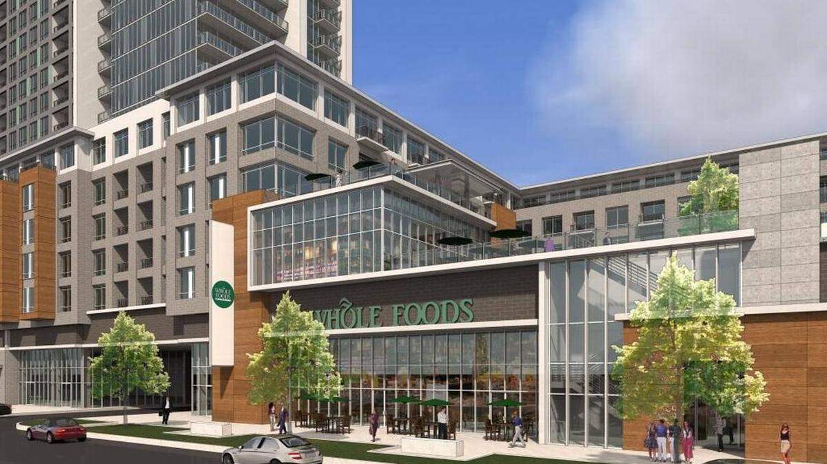 A rendering of the uptown Whole Foods at Novel Stonewall Station. Courtesy of 
Crescent Communities