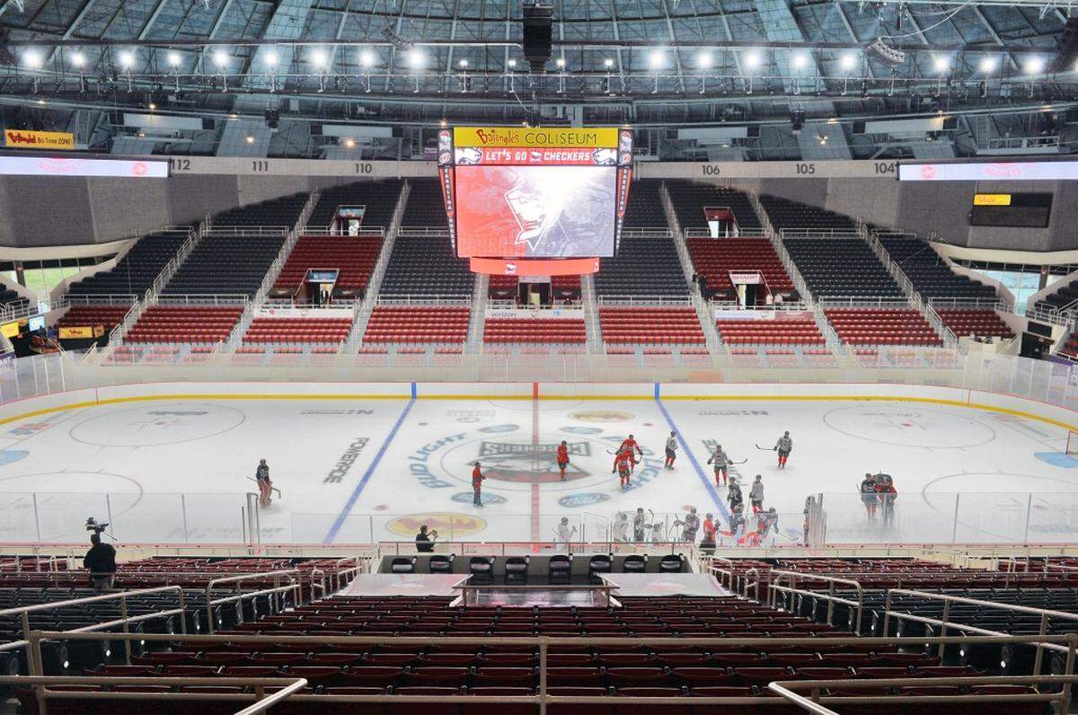 The Charlotte Checkers practice on the newly installed ice rink they will call home.Elected officials and  city representatives  attend  the grand opening celebrate of the completion of the Bojangles' Coliseum renovations. A ribbon cutting  marked the recently revamped 60-year old venue. Phase 1 of the $16 million project includes improvements to seating, technology, locker rooms and more. The completed  renovations came in time for the Charlotte Checkers season home opener on Saturday, Nov. 7 against the Manitoba Moose.