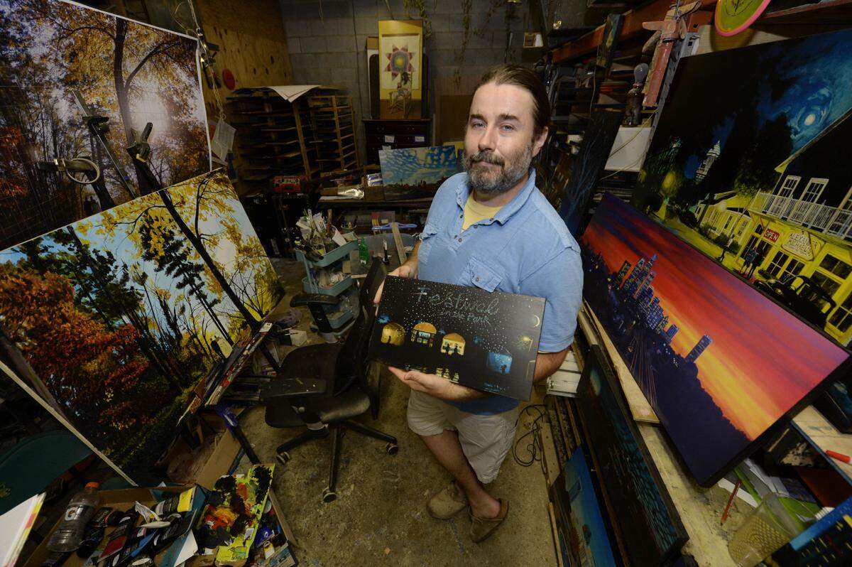 Artist David Thayer French with some of his work in his NoDa studio  on Friday, July 10, 2015.. He’s been a fixture in NoDa for nearly 10 years. dtfoster@charlotteobserver.com