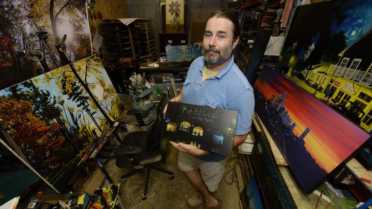 Artist David Thayer French with some of his work in his NoDa studio  on Friday, July 10, 2015.. He's been a fixture in NoDa for nearly 10 years.