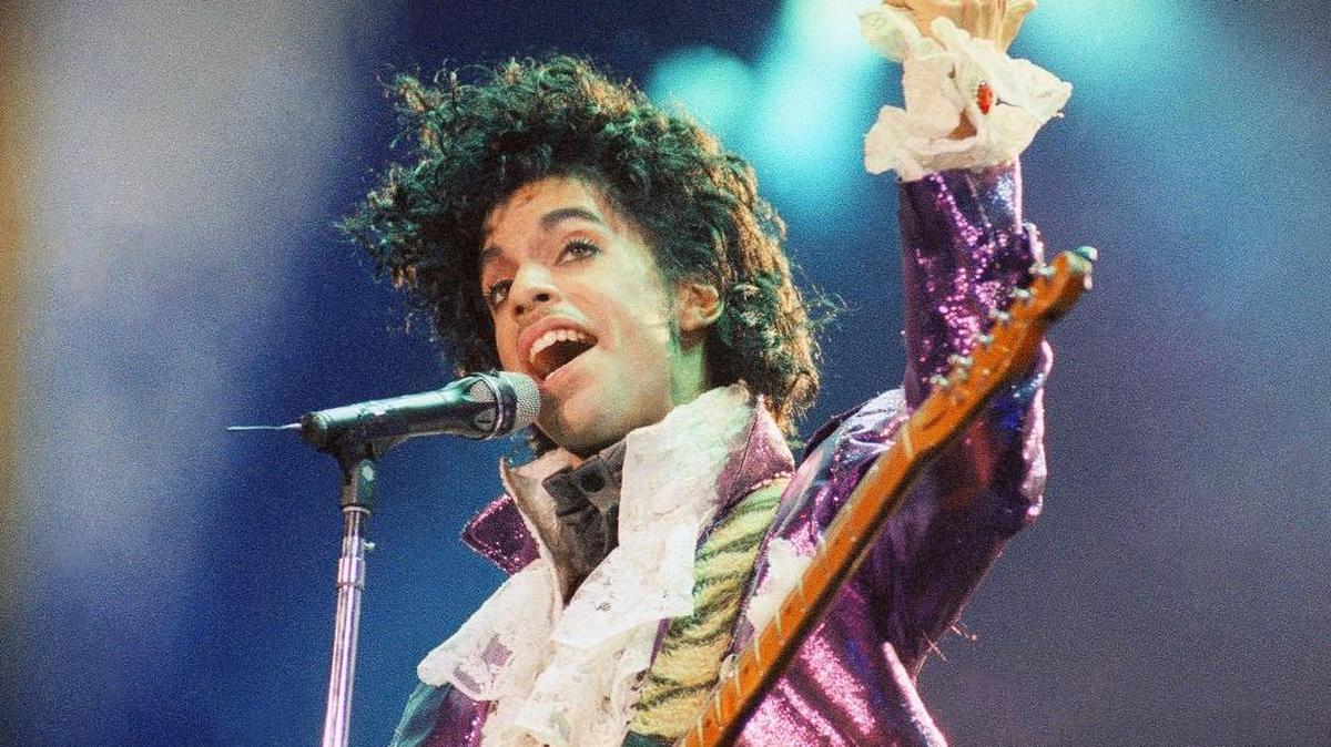 FILE - In this Feb. 18, 1985 file photo, Prince performs at the Forum in Inglewood, Calif. Prince, widely acclaimed as one of the most inventive and influential musicians of his era with hits including "Little Red Corvette," ''Let's Go Crazy" and "When Doves Cry," was found dead at his home on Thursday, April 21, 2016, in suburban Minneapolis, according to his publicist. He was 57.