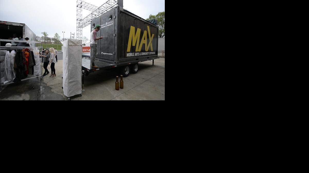 
UNC Charlotte Department of Theatre students help to move into MAX, the Mobile Arts Community Experience, while at Boxman Studios on Tuesday, April 7, 2015. 
