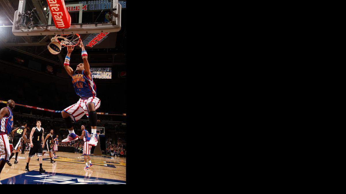 
Julian “Zeus” McClurkin, now in his rookie season with the Harlem Globetrotters, is heading back to North Carolina for a show Saturday at UNCC. McClurkin earned the nickname “Zeus” because of the thunderous sounds made when he dunks the ball. 
