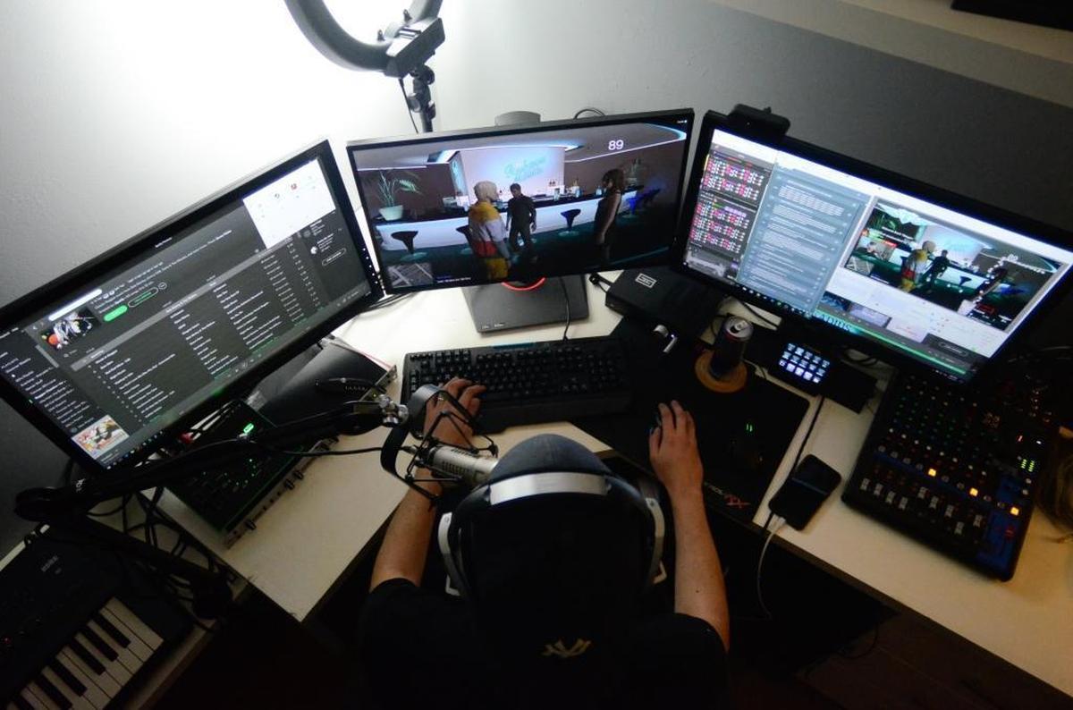 Multiple screens are just part of MacRae’s setup.