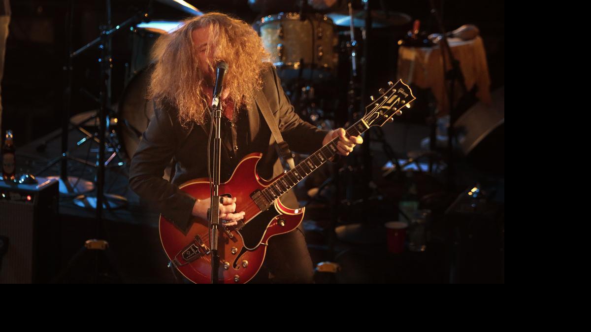
My Morning Jacket will play the Uptown Ampitheatre, 1000 NC Music Factory Blvd. Wednesday. Band member Jim James is shown here playing in Hollywood . 
