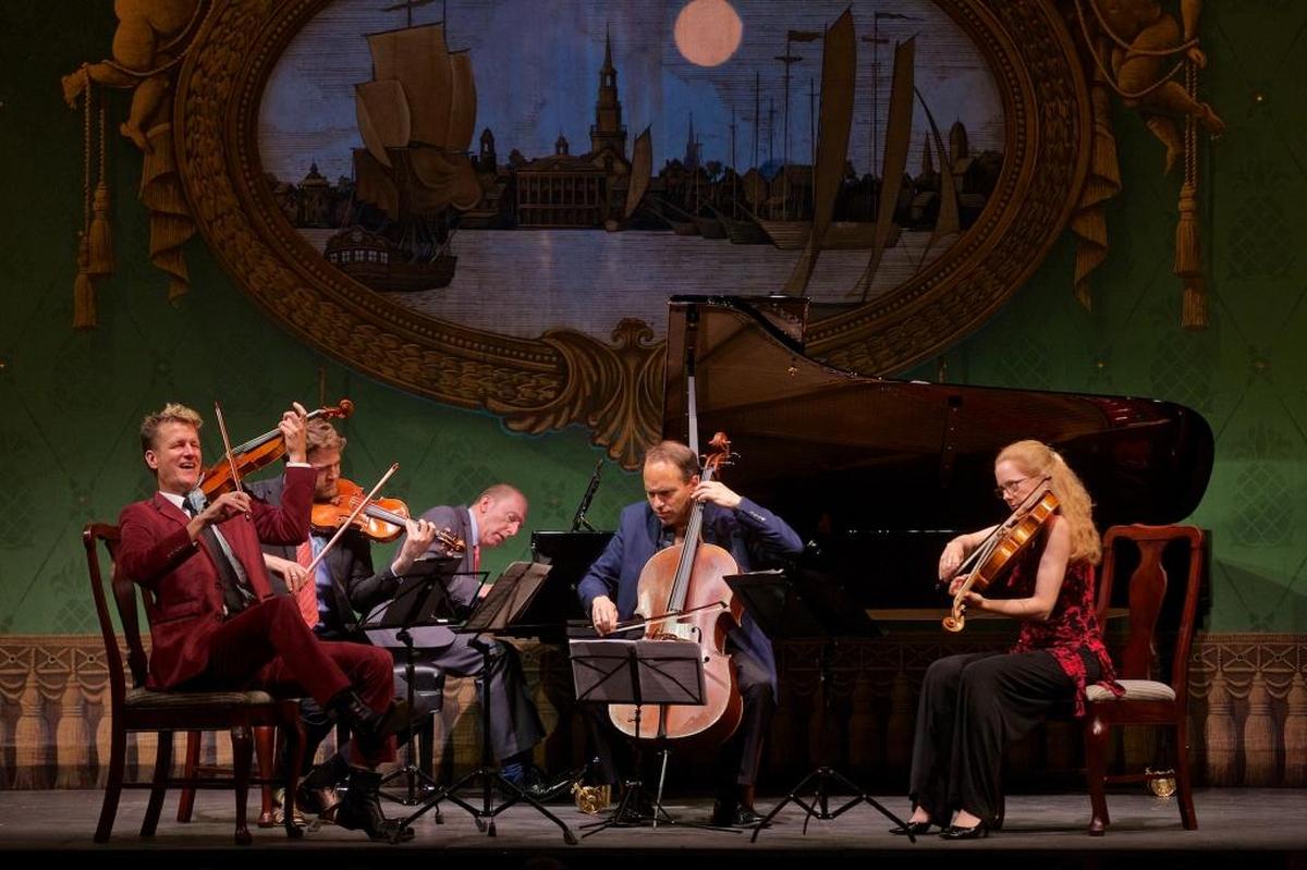 Geoff Nuttall (far left), director of the Bank of America Chamber Music series, with members of the St. Lawrence String Quartet and pianist Pedja Muzijevic.