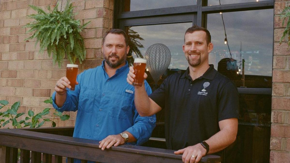 From left, Eric Flanigan and Joe Vogelbacher, co-owners of Sugar Creek Brewing Co.
