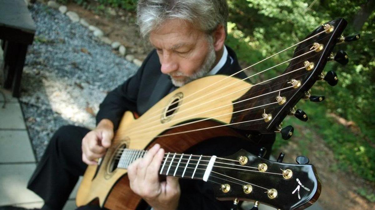 
Randall Sprinkle plays a harp guitar.
