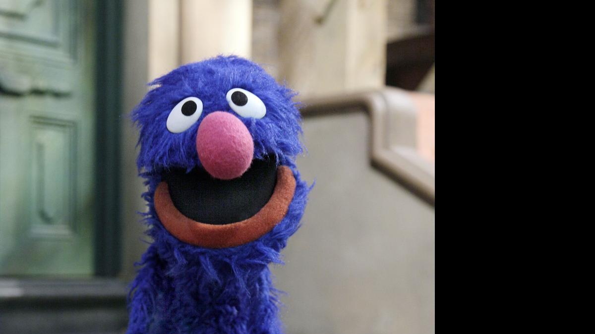 
In this April 11, 2011 photo, Grover is posed on the set of "Sesame Street," in New York. Earning money is one of the financial fundamentals that is part of For Me, For You, For Later, a new project featuring Grover, Elmo, Cookie Monster and their Muppet pals.
