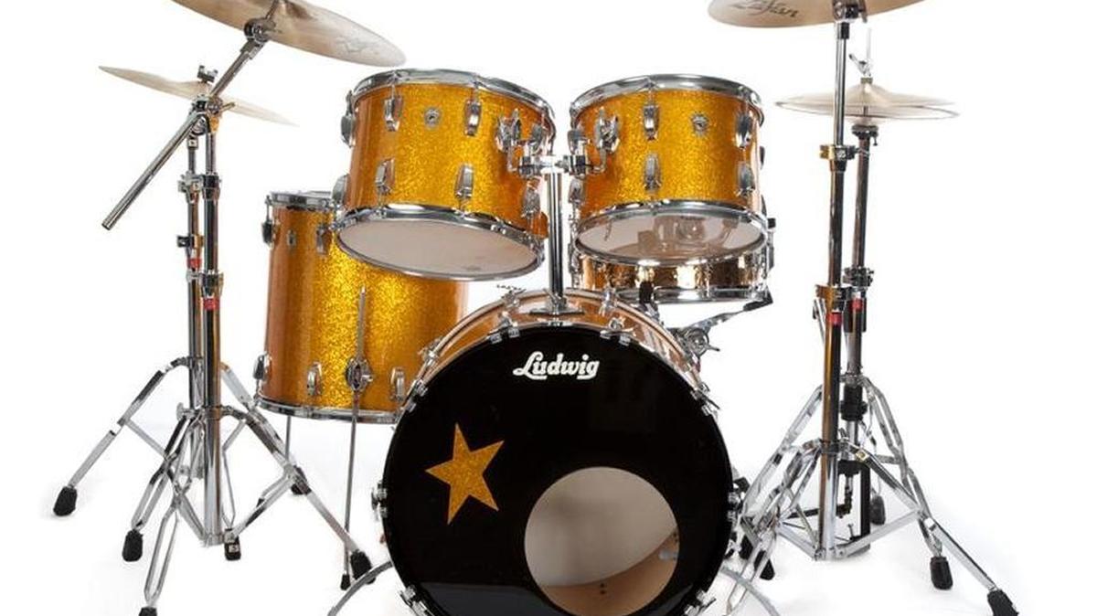 This 2002 Ludwig gold sparkle kit that Ringo Starr used in a memorial concert for George Harrison sold at auction for $64,000.