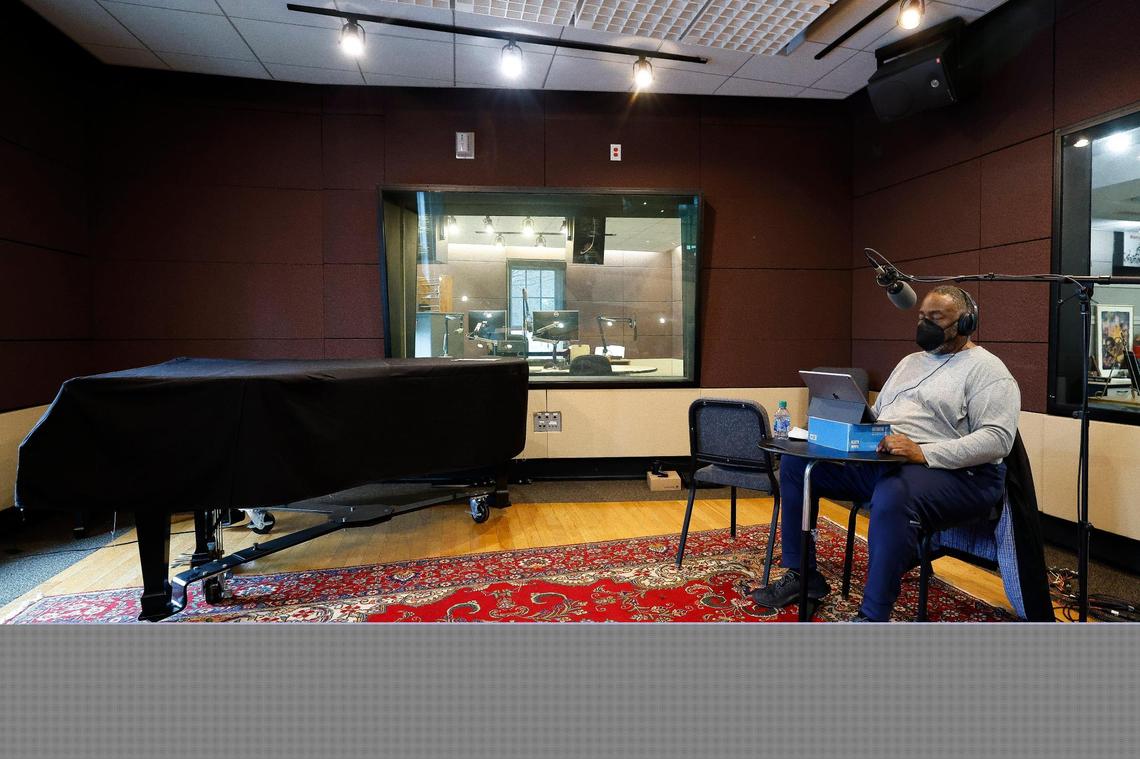 Joshua Hood of Huntersville prepares to record an interview at WDAV Davidson on March 16, 2022. WDAV made history this year by becoming the first classical music radio station to top a U.S. market.