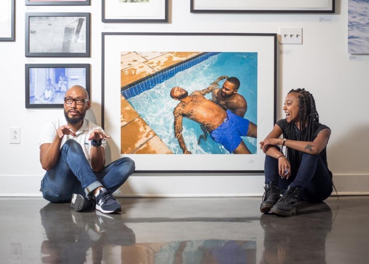 Photographer Zun Lee with Moss at the gallery; his work is included in “BLACK BLOODED” and he’s also the first artist in residence in The Roll Up, a Knight Foundation-supported artist residency Moss created.