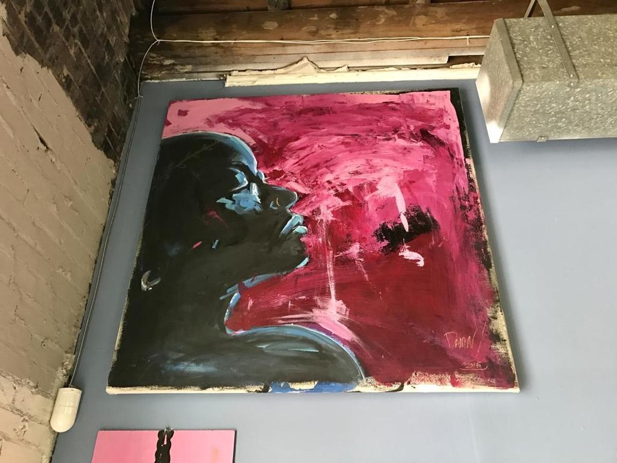 A painting hung in Dupp & Swat’s new location.