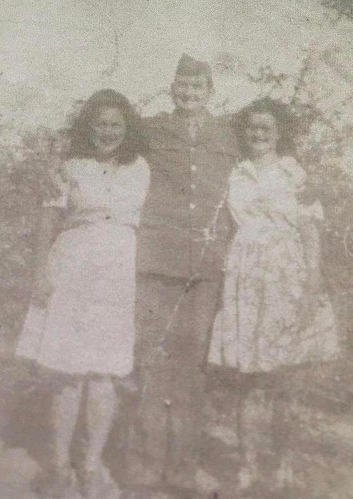 Zacheus Overstreet, Curtis Chancy's great-uncle on his mother’s side, served in World War II, though not at Normandy. Here, he’s shown in uniform in 1943, with his sisters Emma Lou and Marie Stafford, all of Butler, Alabama.