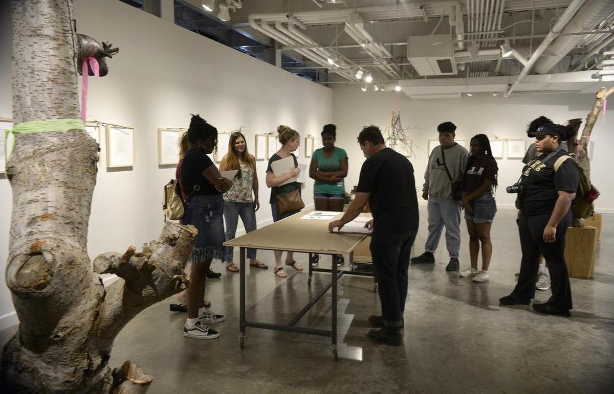 McColl Center artist-in-residence Sam Van Aken works with art students from Studio 345, a program for CMS high school students.