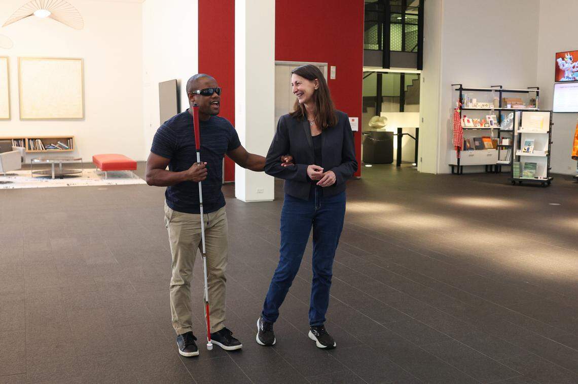 Davian Robinson, left, with Janet Biggs. “People always say visual art isn’t for blind folks,” Robinson said. “But if you just expand the medium, anyone can experience it. Accessibility is about imagination.”