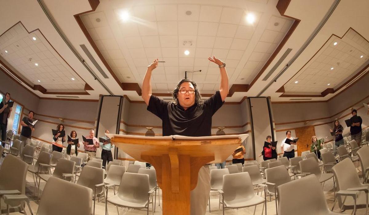 Director David Tang in a past rehearsal of his Vox choir.