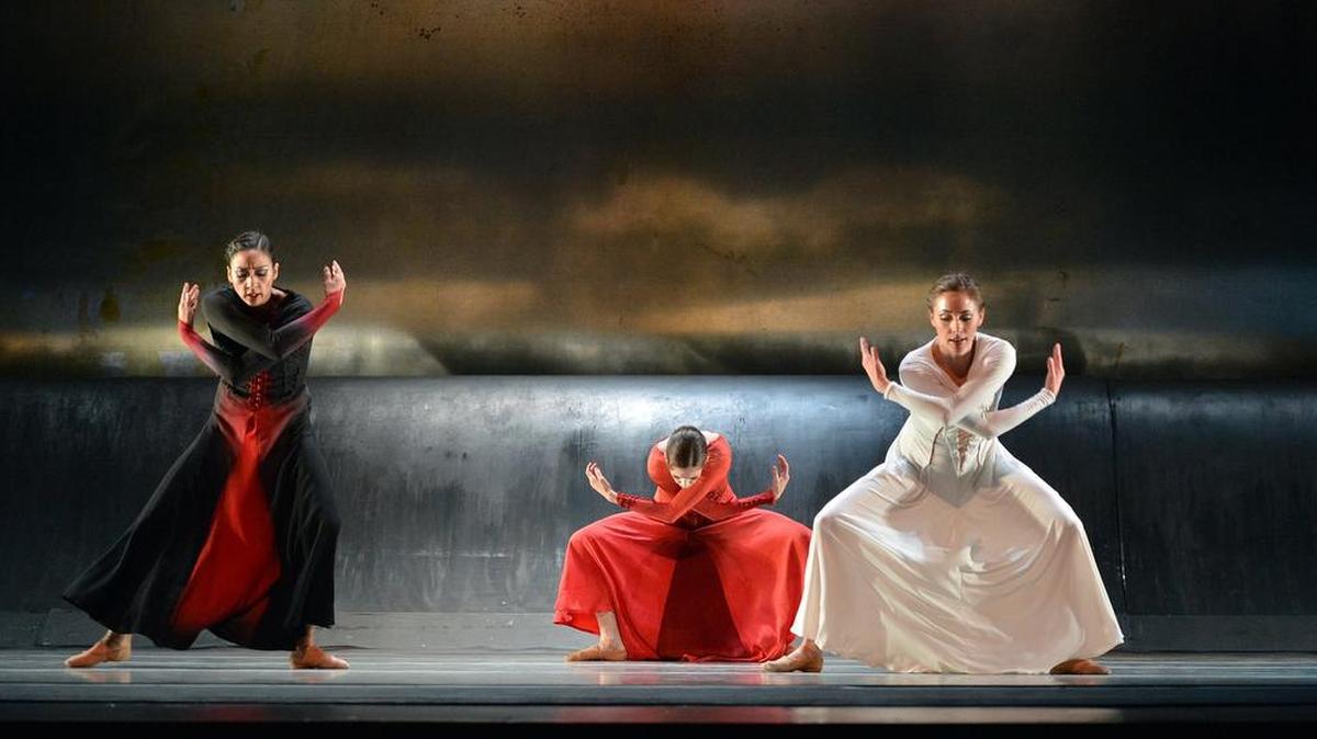 
Melisaa Anduiza,left, Anna Gerberich and Jamie Dee Clifton dance together in “Forgotten Land.” North Carolina Dance Theatre dancers rehears for their current performance of "Othello and Forgotten Land" Dwight Rhoden's updating of "Othello," which takes place in the modern-day music industry, and Jiri Kylian's "Forgotten Land," based on (among other things) an Edvard Munch painting.
