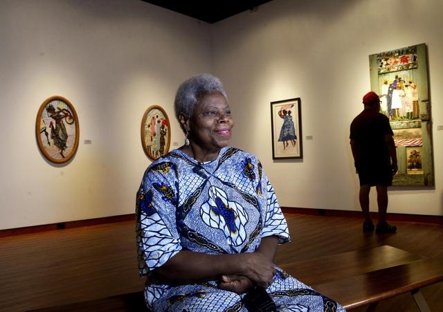 Charlotte mixed media artist Nellie Ashford depicted African-Americans playing, voting and worshiping in segregated, small-town Charlotte in her 2016 Gantt Center show.