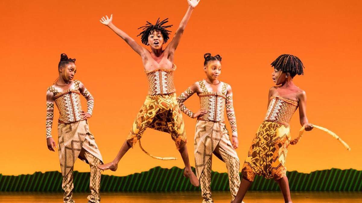 Charlotte’s Ramon Reed (mid-air) is Young Simba as the North American tour of “The Lion King” comes to Blumenthal. Also in the pride: Danielle Jalade, Gloria Manning and Joziyah Jean-Felix.