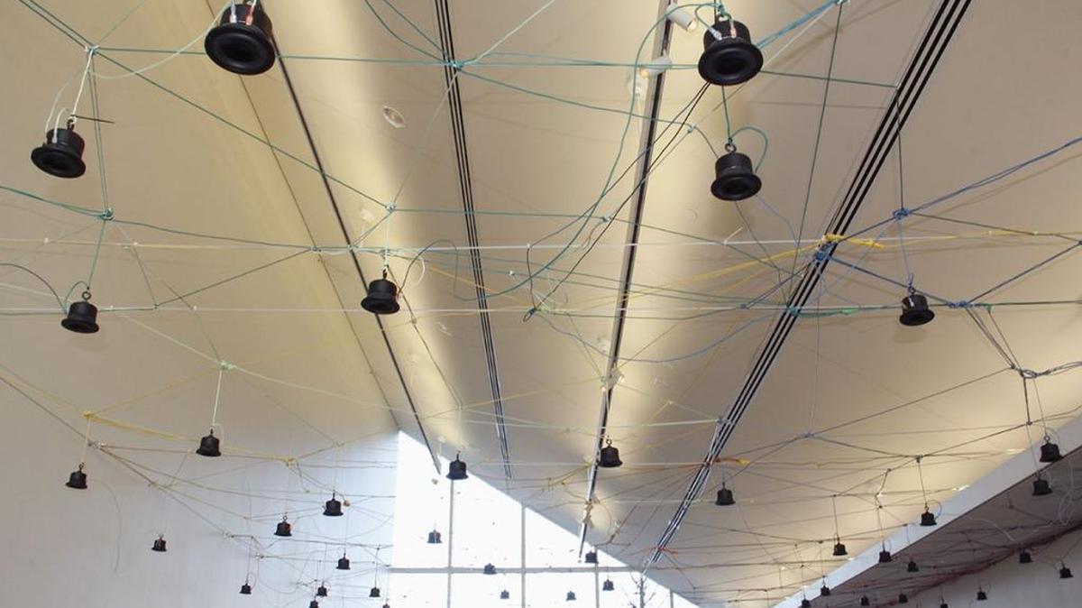This photo shows the gallery installation of Julianne Swartz’s work ‘Terrain’ at Projective Eye: 100 speakers are involved in the multimedia presentation.