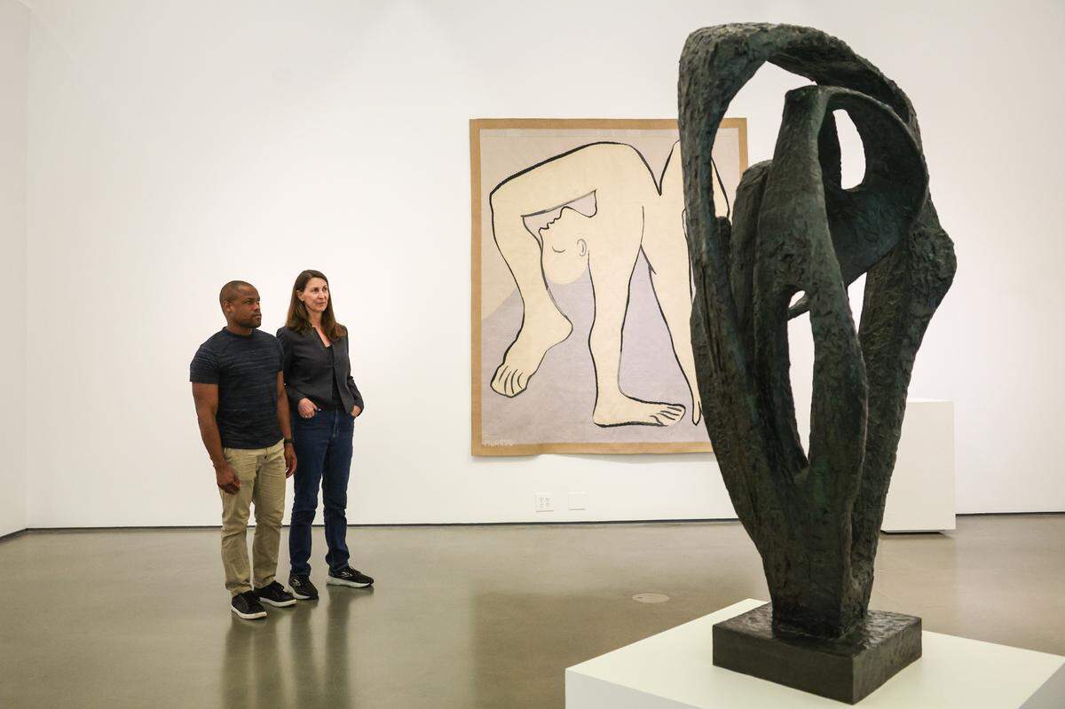 Davian Robinson, left, and Janet Biggs look over a room in the Bechtler Museum where a sound installation where a sound installation will be featured alongside permanent pieces of art. The installation is part of “Collection, Reframed: We Are Here, Beyond Vision,” which runs from July 2-Sept. 22.