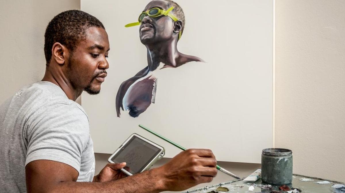 Charles Williams at work on a self-portrait.