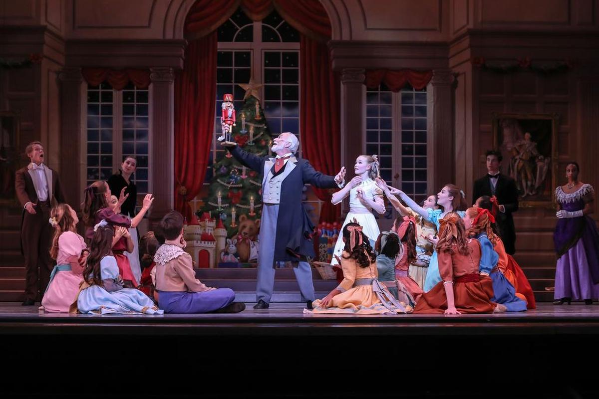 Mark Diamond holds the Nutcracker aloft, as Drosselmeyer, in Charlotte Ballet’s annual Nutcracker. This year, the Nutcracker, which was supposed to take place Dec. 4-27, has been canceled due to coronavirus concerns, according to the ballet.