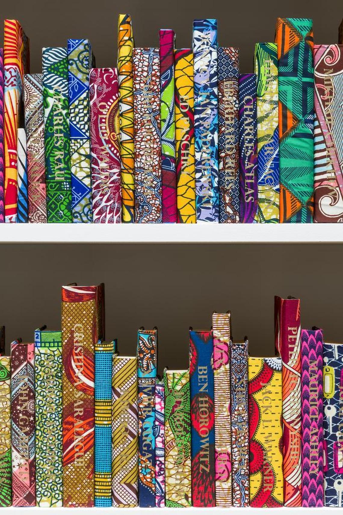 Installation closeup of Shonibare’s “The American Library.”