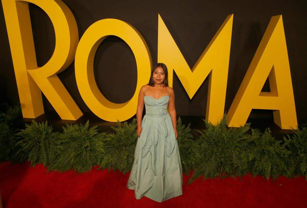 Mexican actress Yalitza Aparicio poses on the red carpet for her film “Roma” in Mexico City on Dec. 17. The film is about a middle class family living in Mexico City in the 1970’s, inspired by the childhood days of Alfonso Cuaron, Roma’s director.
