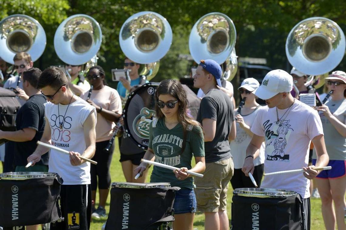 Snare drummer Raven Pfeiffer (center), at the band’s last rehearsal on campus before leaving for France. Her great-grandfather fought there, and came home with a Silver Star and three Bronze Stars.