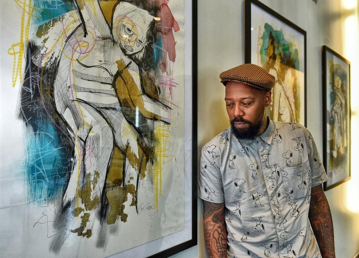 Miya Bailey with his work at the Gantt.