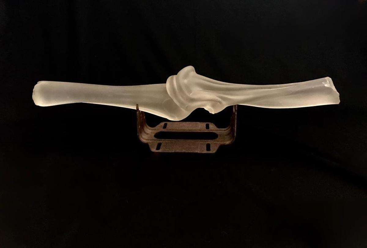 “Damaged Bone Series,” 2003, by Michael Aschenbrenner. It’s made of glass and steel.