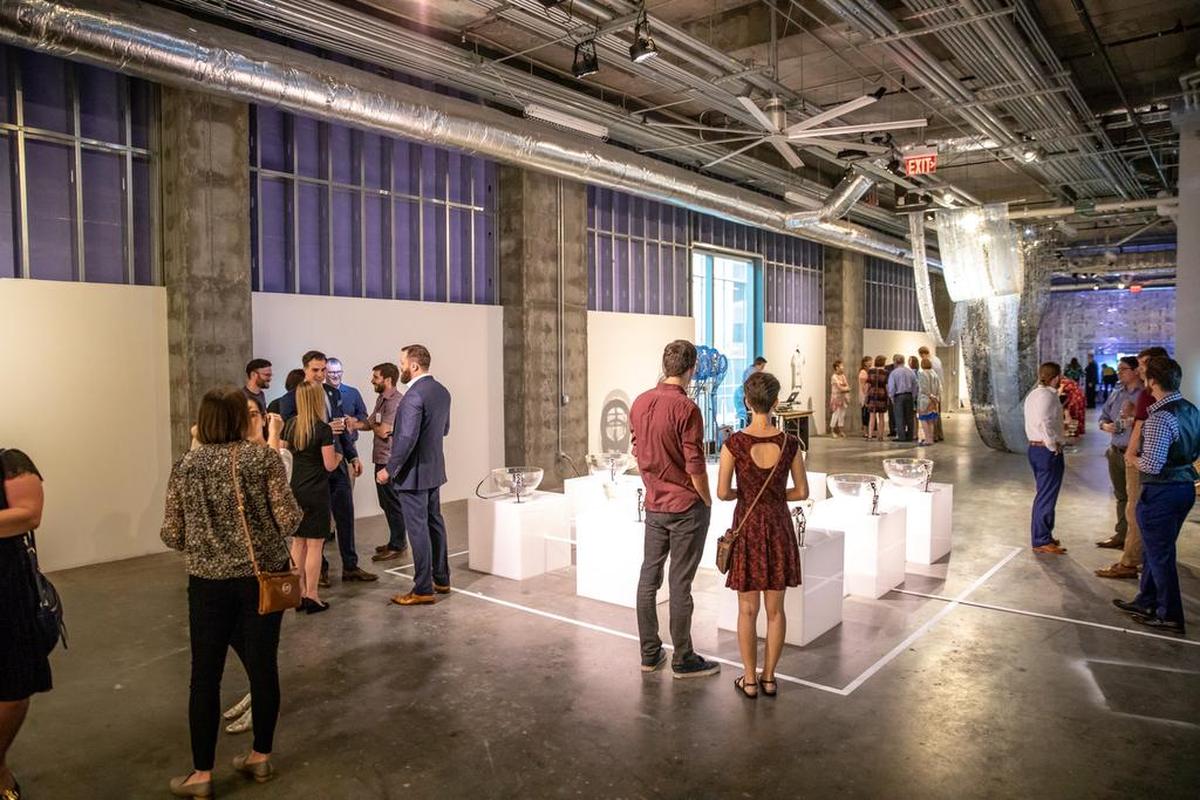 Opening night at “Mainframe,” the Young Affiliates of the Mint (YAM)’s third annual juried show.