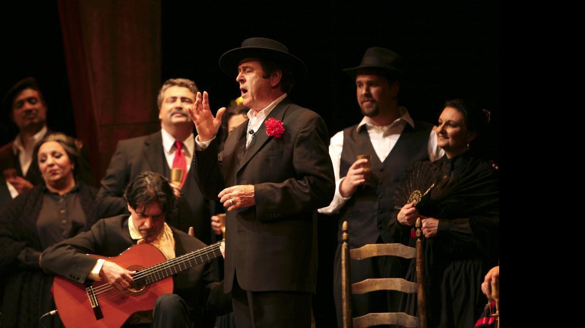
Aris Quiroga plays guitar in Opera Carolina’s Vida Breve in 2007.
