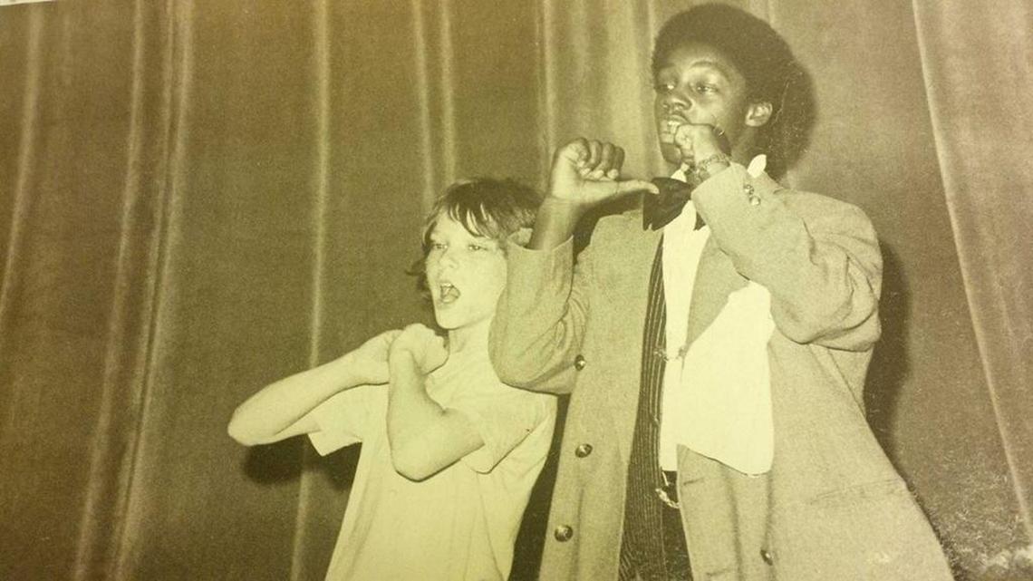 When Love, “a dear old friend and playmate,” was named a Guggenheim Fellow in 2017, Larry Tobias posted this photo on Facebook: “I submit a photo of the two of us killin’ it, age 12.” This was 1974 or ’75, at Charlotte’s Piedmont Open Middle School, the New York-based actor/musician/director now recounts. It was “Oliver!”: “John played The Artful Dodger, and I played Oliver Twist. We had a pretty amazing group of kids, terrifically dedicated and inspiring teachers, and an awful lot of fun in the early days of Charlotte’s Open Schools. I’ve always admired John for his fearlessness, his willingness to go further and with more commitment to his craft than many his peers (though, in my opinion, he is actually peerless). Even when we were kids together, it was pretty obvious he was bound for greatness.”
