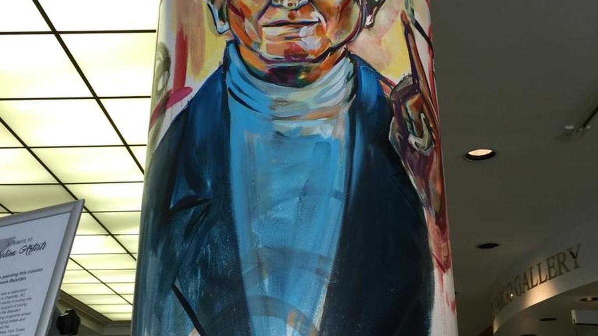 Work in progress at the Spirit Square atrium: local artist John Hairston Jr.’s painting of Romare Bearden. Hairston, a UNCC graduate, describes his work as blending “political satire, social commentary and obscure pop-culture references.”
