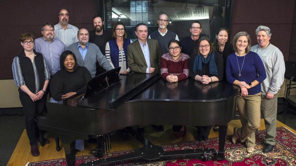 WDAV staff (from left): Rachel Stewart, Rodger Clark, Tamberly Ferguson, Jay Ahuja, Frank Dominguez, Will Keible, Andrea Geisinger, Bruce Scott, Jon Barcelo, Charmaine DeGuzman, Joe Brant, Amanda Preston, Kendra Intihar, Sarah Demarest and Ted Weiner. (Not pictured: Mike McKay and Myelita Melton.)