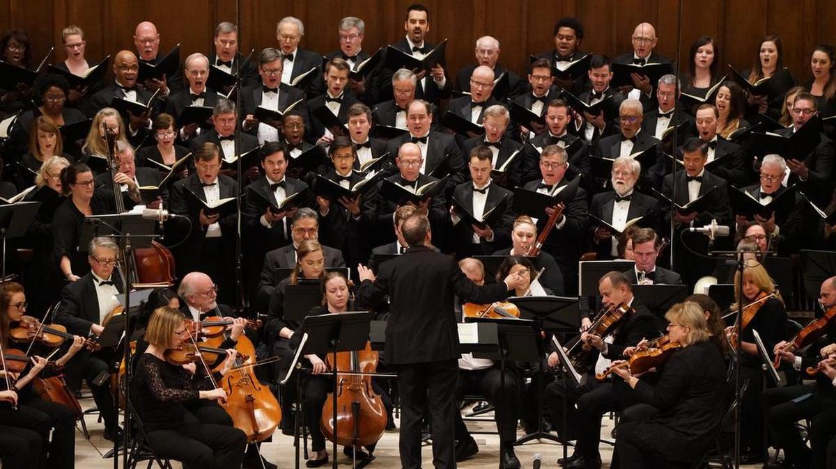 Potter conducting the chorus.