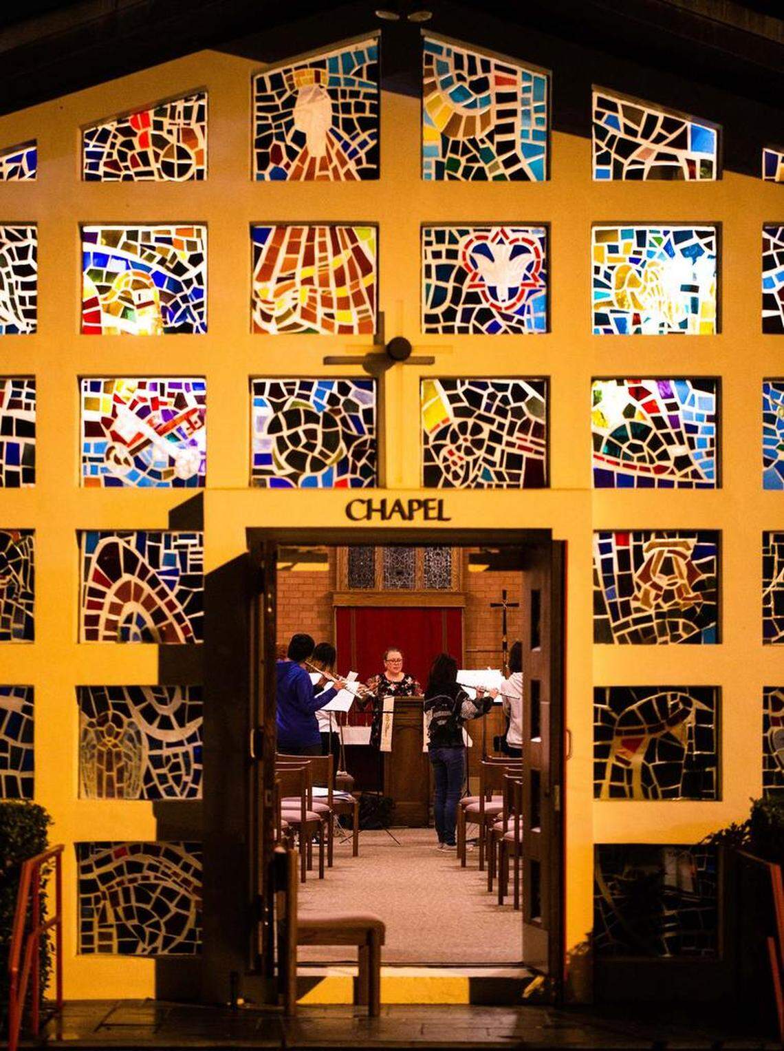 The woodwinds section of the Youth Orchestra of Charlotte practices in the chapel at St. Luke’s Lutheran Church.