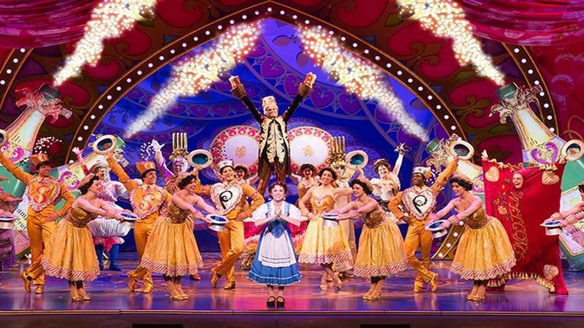 
The enchanted characters in “Beauty and the Beast” invite Belle to “Be Our Guest.”
