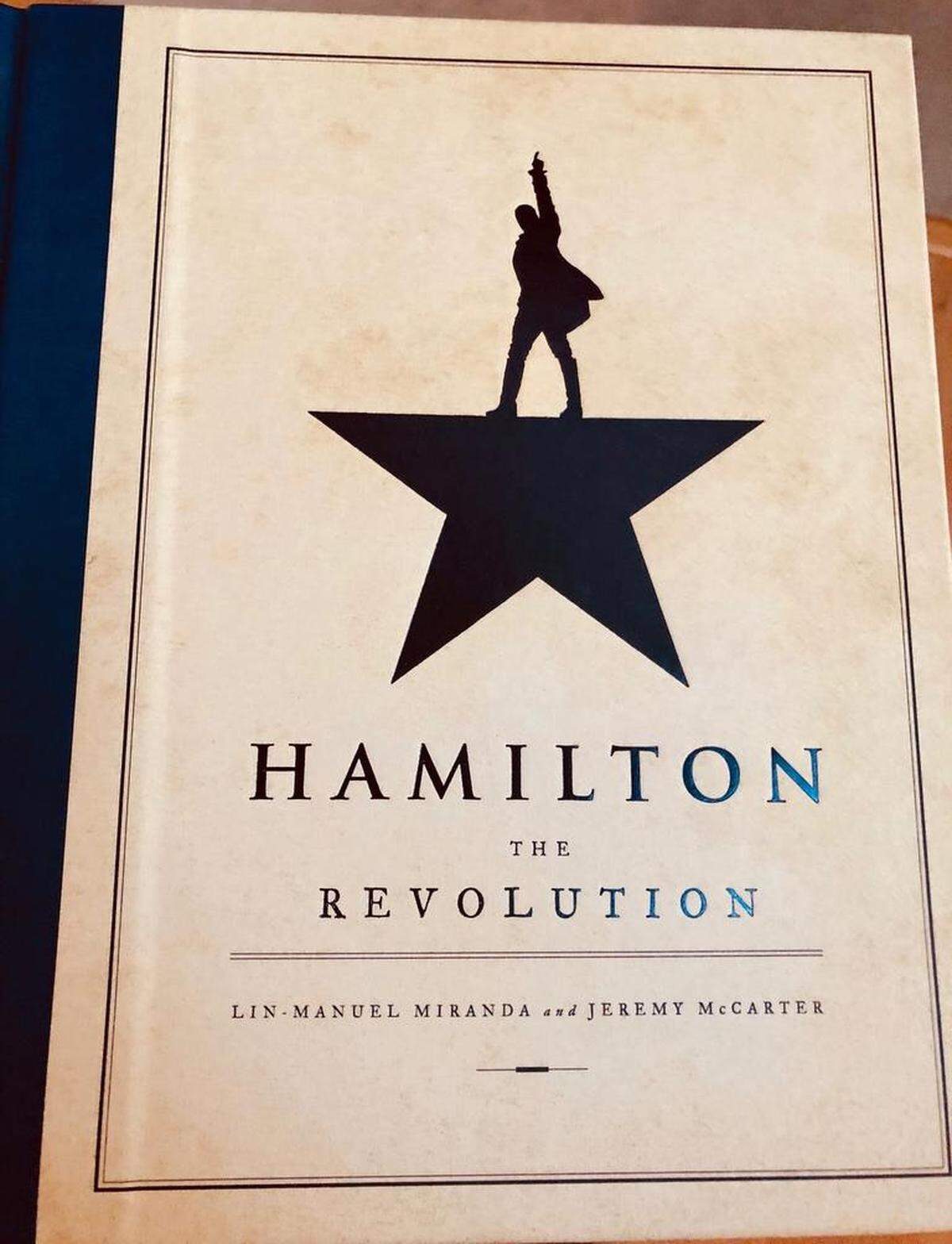 “Hamilton The Revolution” tells the behind-the-scenes story of the creation of the musical “Hamilton.”